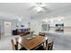 Bright dining area adjacent to the kitchen and living room, perfect for entertaining and everyday meals at 4825 Loretta Ln, Orlando, FL 32821