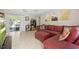 Inviting living room with a sliding door to the patio and a comfortable L-shaped couch at 4825 Loretta Ln, Orlando, FL 32821