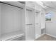 Walk-in closet with custom shelving and hanging rods at 5030 Caspian St, St Cloud, FL 34771