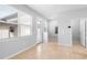 Entry room with tile flooring, natural light from window and glass door, and access to a utility closet at 5030 Caspian St, St Cloud, FL 34771