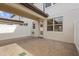 Secluded patio with brick paving, featuring covered area and gated access at 5030 Caspian St, St Cloud, FL 34771
