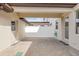 Private brick-paved patio with white fencing for added privacy, accessible from multiple doors at 5030 Caspian St, St Cloud, FL 34771