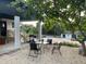 An outdoor dining set in the backyard area at 610 Cypress Ave, Orange City, FL 32763