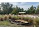 Backyard filled with lovely plantings and gathering areas at 610 Cypress Ave, Orange City, FL 32763
