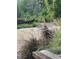 Backyard with a fire pit and seating area at 610 Cypress Ave, Orange City, FL 32763