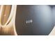 Close up of a modern bathroom mirror with integrated touch controls at 610 Cypress Ave, Orange City, FL 32763