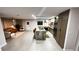 Open-concept living space with modern kitchen and large island with seating at 610 Cypress Ave, Orange City, FL 32763