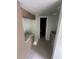 A view into the laundry room with custom cabinets and neutral gray counter at 610 Cypress Ave, Orange City, FL 32763