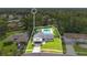 An aerial view shows the lovely pool and the home's crisp landscaping at 614 Mockingbird Ln, Altamonte Springs, FL 32714