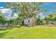 A spacious storage shed in the backyard provides ample space for tools, equipment, and other outdoor essentials at 614 Mockingbird Ln, Altamonte Springs, FL 32714