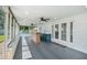 Spacious sunroom with tile flooring and a bar area at 614 Mockingbird Ln, Altamonte Springs, FL 32714