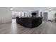 A spacious living room boasts hardwood floors, recessed lighting, and ample room for seating and entertainment at 622 Avenue D Se, Winter Haven, FL 33880
