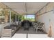 Outdoor patio featuring seating, a grill, and lush greenery at 622 Avenue D Se, Winter Haven, FL 33880