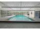 Refreshing in-ground pool within a screened enclosure at 622 Avenue D Se, Winter Haven, FL 33880