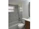 Updated bathroom featuring a tub, shower, and vanity at 6366 Forecastle Ct, Orlando, FL 32807