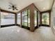 Enclosed patio provides a versatile space for outdoor enjoyment at 6971 Tettenhall Ln, Windermere, FL 34786