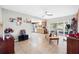 Open-concept living room seamlessly connects to a kitchen, creating a spacious and inviting area at 7022 Talbot Dr, Orlando, FL 32819