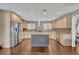 Well-equipped kitchen with a large island, stainless steel appliances, and ample storage at 7801 Georgeann St, Winter Park, FL 32792