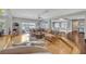 Open concept living space with views of the lake and adjoining dining area at 7801 Georgeann St, Winter Park, FL 32792