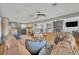 Spacious living room with open layout, stylish furnishings, and seamless flow at 7801 Georgeann St, Winter Park, FL 32792