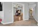View of a functional home office, with tile floor, ceiling fan, and closet for easy organization at 7801 Georgeann St, Winter Park, FL 32792