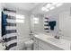 This is a bathroom featuring a shower and tub with a combined toilet and sink at 906 Highland Crest Cir, Lake Wales, FL 33853
