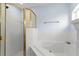 Bright bathroom featuring a separate shower and a luxurious soaking tub, perfect for relaxation at 906 Highland Crest Cir, Lake Wales, FL 33853