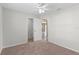 This bedroom features a carpeted floor and a ceiling fan for added comfort at 906 Highland Crest Cir, Lake Wales, FL 33853