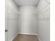 Walk-in closet includes plenty of shelving for maximum storage at 906 Highland Crest Cir, Lake Wales, FL 33853