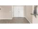 Inviting foyer with tile flooring, neutral walls, and a view of the home's interior at 906 Highland Crest Cir, Lake Wales, FL 33853