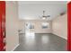 Open-concept living room with tile flooring, sliding glass doors and lots of natural light at 906 Highland Crest Cir, Lake Wales, FL 33853