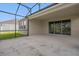 Spacious screened-in patio with sliding glass doors to the interior at 9535 Beautiful Way, Winter Garden, FL 34787