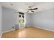 Inviting bedroom with hardwood floors, natural light, and simple decor, providing a comfortable living space at 956 Chula Ct, Lady Lake, FL 32159