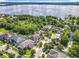 An aerial view of a luxury home in a neighborhood on a lake at 10319 Lavande Dr, Orlando, FL 32836