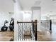 Hallway with ornate railing, connecting different areas of the house at 10319 Lavande Dr, Orlando, FL 32836