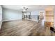 Expansive living room with hardwood floors, decorative railing, and lots of space for entertaining at 10319 Lavande Dr, Orlando, FL 32836