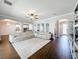 Bright and airy living room with open floor plan, tile floors, and recessed lighting at 10319 Lavande Dr, Orlando, FL 32836