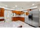 Updated kitchen featuring stainless steel appliances, beautiful wood cabinetry, and granite countertops at 105 John Anderson Dr, Ormond Beach, FL 32176