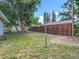 Large backyard featuring a well-maintained lawn and a privacy fence at 117 Burns Ave, Longwood, FL 32750