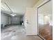 View of the garage featuring a garage door and a door to the home's interior at 117 Burns Ave, Longwood, FL 32750