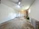 Spacious garage with a ceiling fan and ample space for storage or parking at 117 Burns Ave, Longwood, FL 32750
