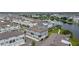 Lakeside living featuring modern townhomes with beautiful landscaping, close to community amenities at 12468 Koshiba Aly, Orlando, FL 32827