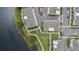 High angle shot of modern townhomes situated near a lake offering tranquil views and upscale living at 12468 Koshiba Aly, Orlando, FL 32827