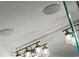 Bathroom ceiling with modern light fixture, speakers, and neutral colored paint at 12468 Koshiba Aly, Orlando, FL 32827