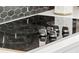 Close-up of a modern electric cooktop and controls at 12468 Koshiba Aly, Orlando, FL 32827