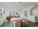 Open-concept living area featuring sleek flooring and abundant natural light at 12468 Koshiba Aly, Orlando, FL 32827
