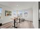 Bright home office with natural light, wood floors, and neutral wall color at 12468 Koshiba Aly, Orlando, FL 32827