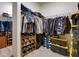 Large walk-in closet with built-in organizers and shelving for ample storage space at 12832 Sawgrass Pine Cir, Orlando, FL 32824