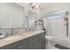 Bathroom featuring a double vanity, a shower, and a bath at 14524 Huntingfield Dr, Orlando, FL 32824