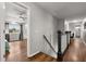 Hallway with hardwood floors that leads to a bedroom at 14524 Huntingfield Dr, Orlando, FL 32824
